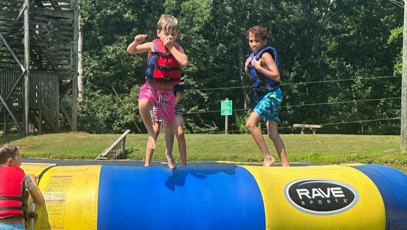 summer-day-camp-blob-lake-jump-group image Overnight Camp Photo 1